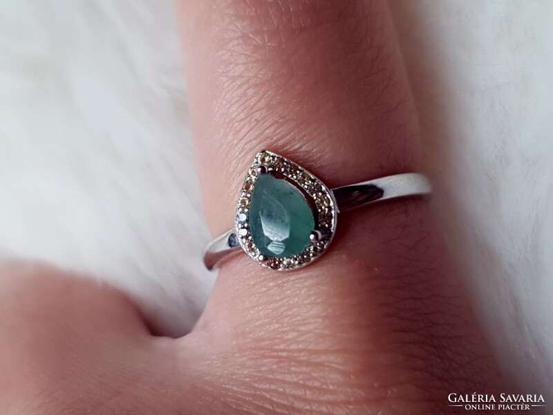 A beautiful silver ring with an emerald stone