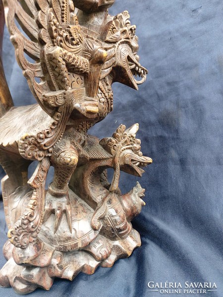 Balinese wood carving, bird of god Garuda-Vishnu from Hindu mythology.