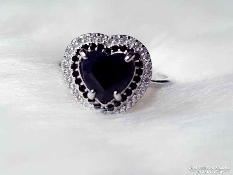 A beautiful silver ring with a black sapphire stone