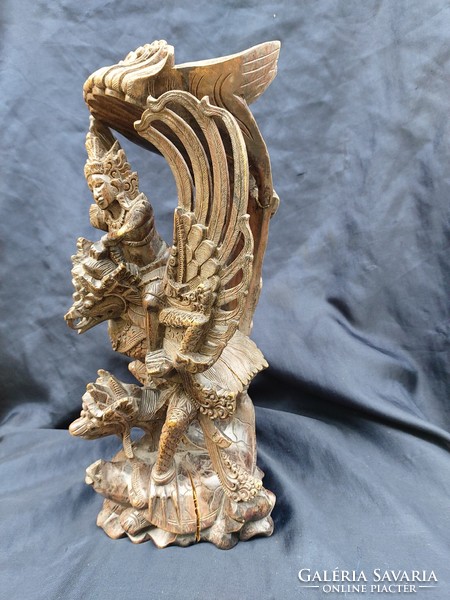 Balinese wood carving, bird of god Garuda-Vishnu from Hindu mythology.