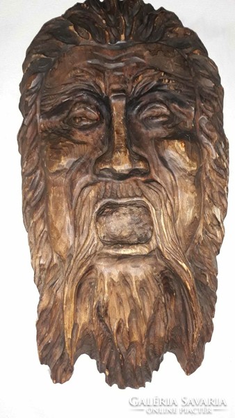 Carved wooden head, can be hung