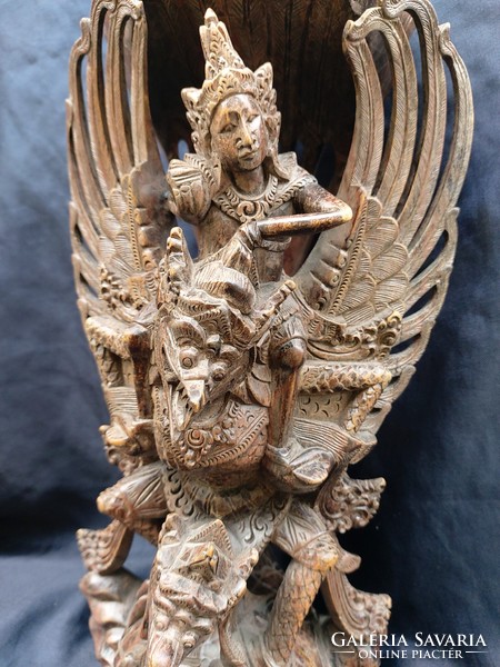 Balinese wood carving, bird of god Garuda-Vishnu from Hindu mythology.