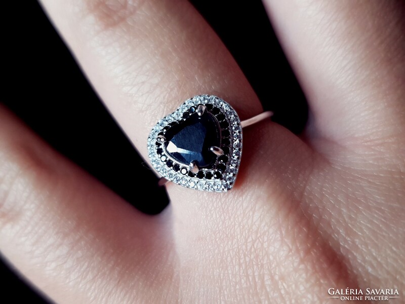 A beautiful silver ring with a black sapphire stone