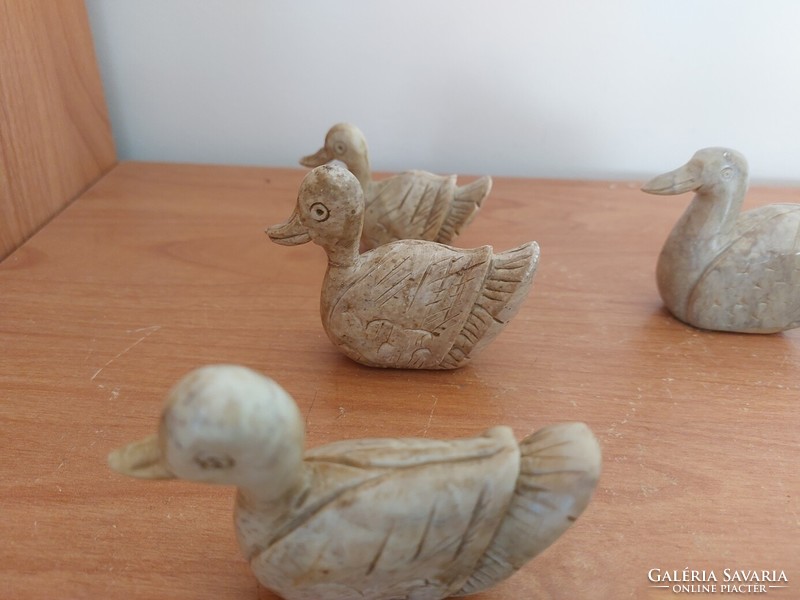 (K) stone carved ducks