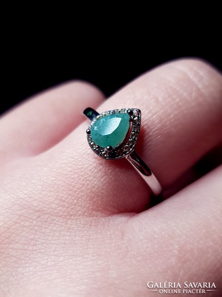 A beautiful silver ring with an emerald stone