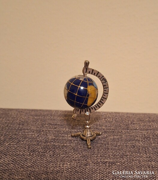 Miniature silver ceramic globe