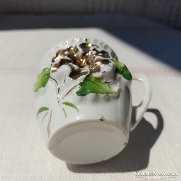 Art nouveau embossed porcelain mini souvenir mug
