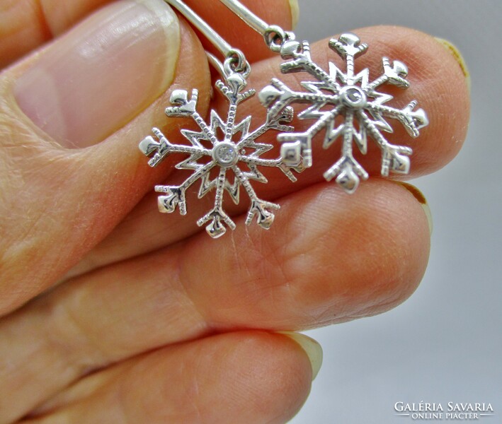 Beautiful snowflake silver earrings with diamonds