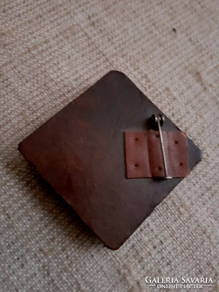 Genuine leather brooch in nice condition