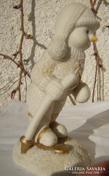 Cheerful skiing figure for winter decoration