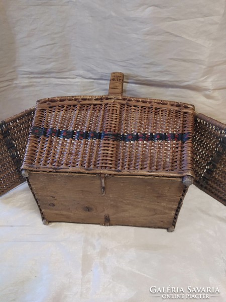 Antique wicker basket with lid