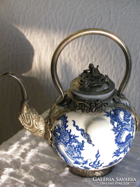 Chinese porcelain pourer with metal filigree decorations (animal figure on top)