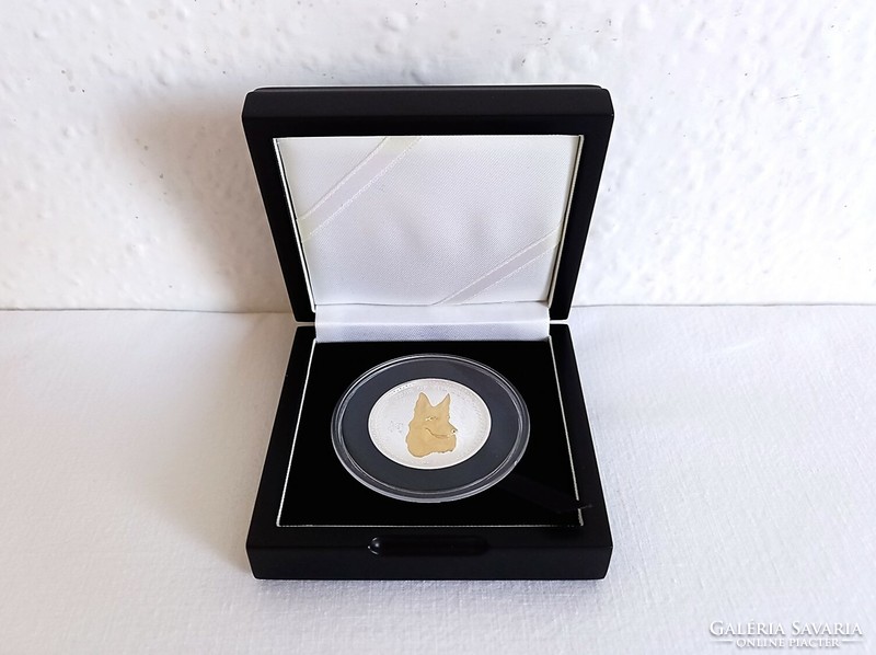 1 ounce partially gold-plated silver coin with a German shepherd dog motif