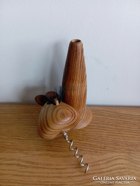 Retro wooden mouse plug puller.