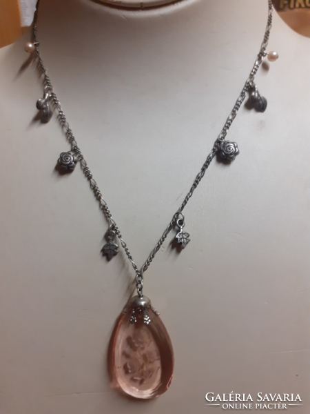 Old silver-plated chain in good condition with a pink glass pendant with a rose bouquet pattern inside