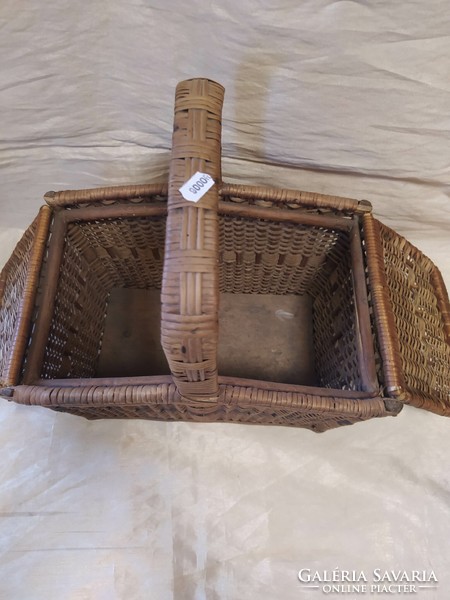 Antique wicker basket with lid