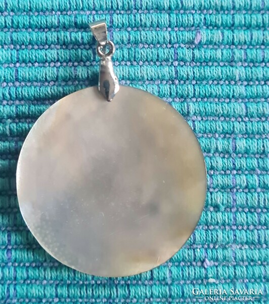 A new carved shell pendant from Bali