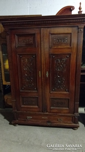 2 Pewter cabinets with hangers and shelves, with detailed, rich carving