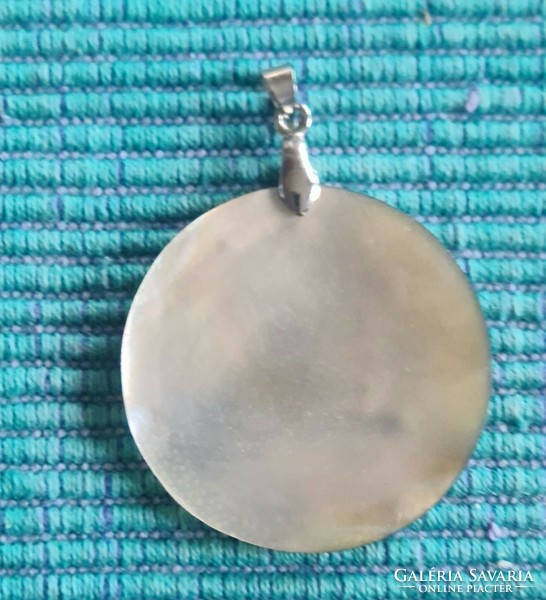 A new carved shell pendant from Bali