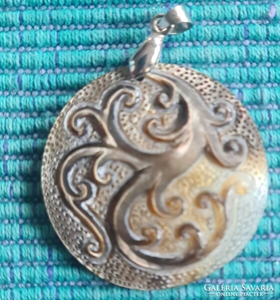 A new carved shell pendant from Bali