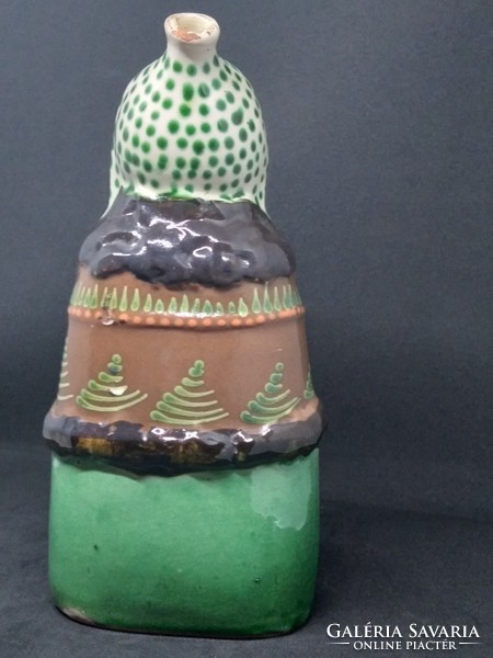 Female ceramic bottle