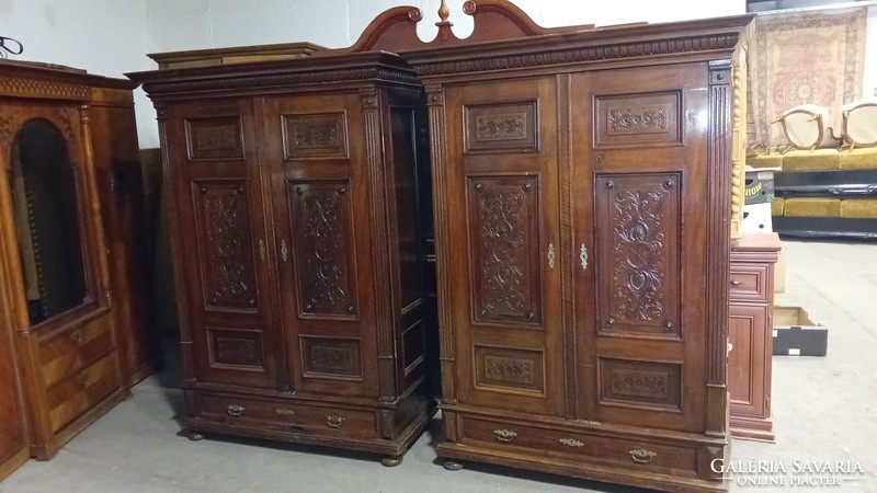2 Pewter cabinets with hangers and shelves, with detailed, rich carving