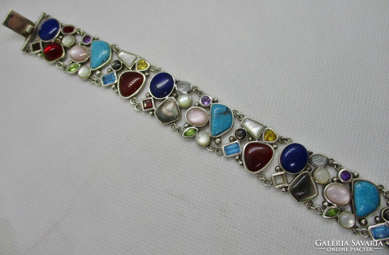 Goldsmith's miracle with many precious stones, silver bracelet