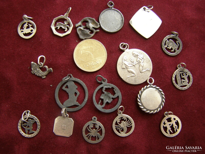 17 old, mainly Hungarian, silver horoscope pendants