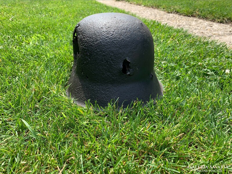 II. WW2 German m42 helmet with shrapnel hit