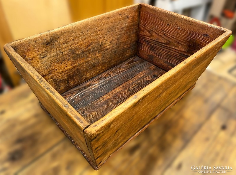 Renovated rustic natural-colored wooden chest, for toys, newspapers, firewood, retro vintage