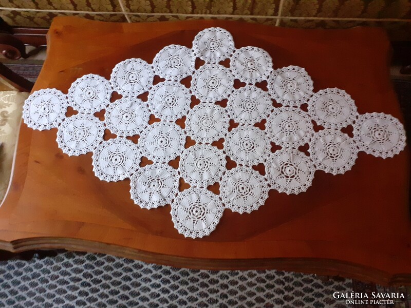 Crocheted tablecloth. 95 X 57 cm