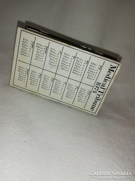Extremely rare metal napkin holder with 1974 calendar inscribed medical tribune