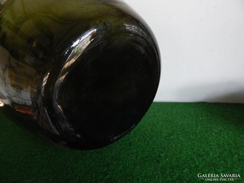 Green glass large wine bottle, height, 48 cm.