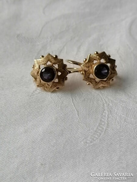 A pair of women's earrings with 14 carat amethyst stones