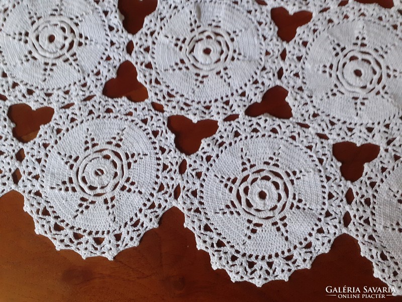 Crocheted tablecloth. 95 X 57 cm
