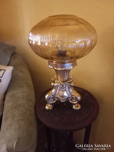 A beautifully crafted copper cast table lamp with a wonderful shade