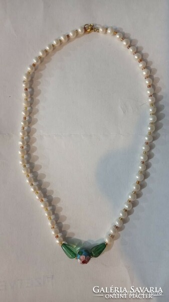 Women's string of pearls, old necklace made of real pearls with small pearls