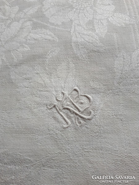 6 antique damask napkins with a floral pattern