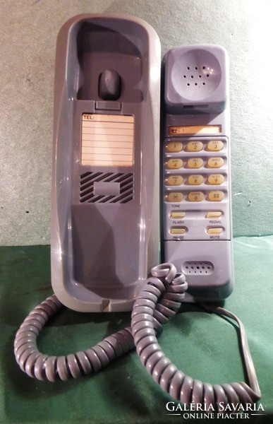 Wired push-button telephone (can also be hung on the wall) made by Concord