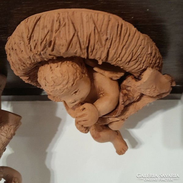 Christmas pillar ceramics: little angel in the manger in Bethlehem - art&decoration