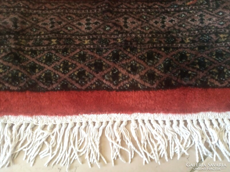 Persian carpet with Bochara pattern