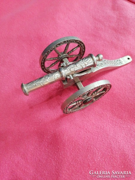 Old silver-plated decorative cannon