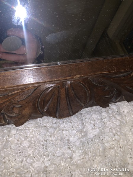 !!!Special offer today only!!!A showy brown carved wooden framed mirror in size 44x56 cm