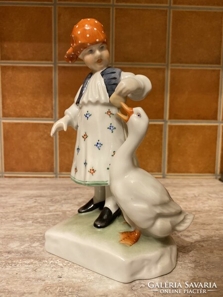 Porcelain girl feeding geese from Herend
