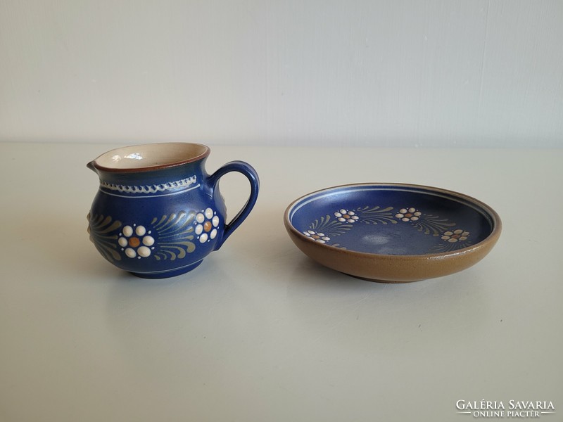 Folk ceramic cream pouring jug with blue flowers