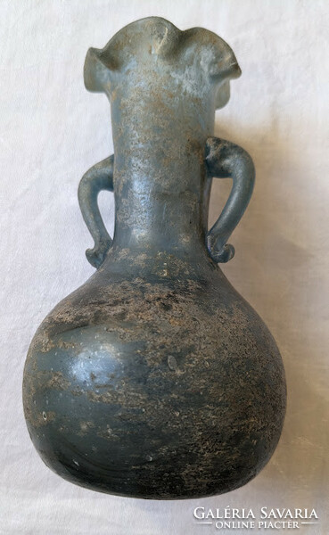 Antique Roman glass vase in green color