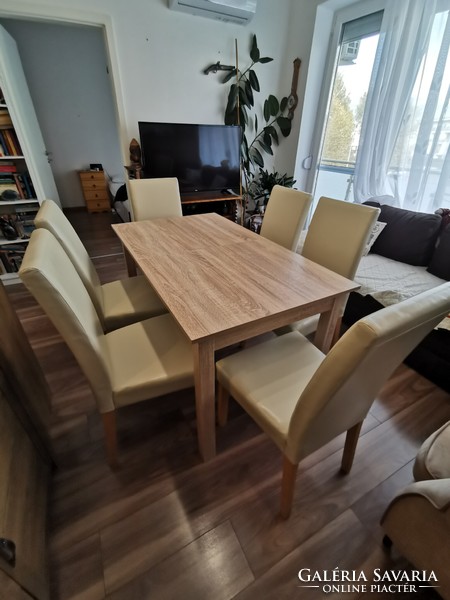 Extendable dining table with 6 chairs for sale