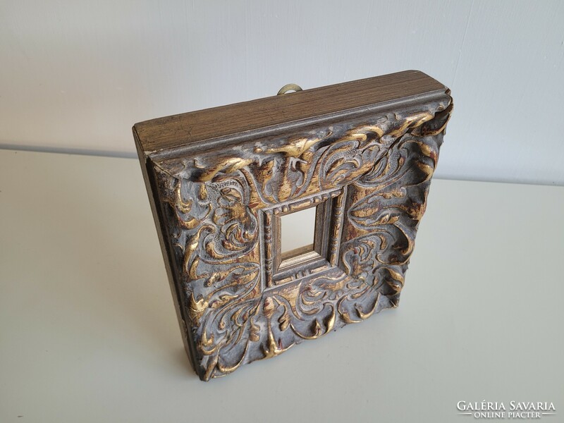 A thick picture frame for a small-sized work