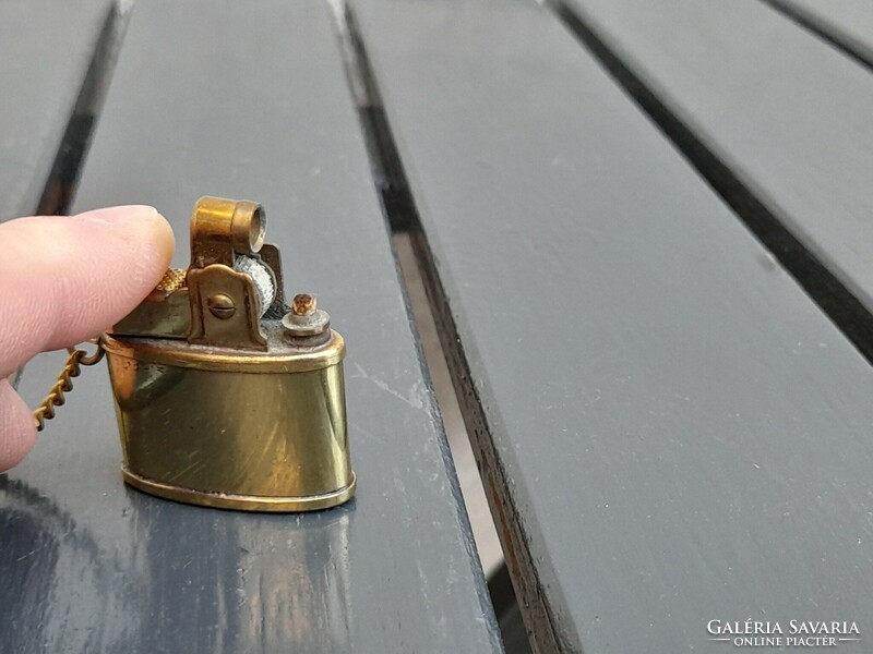 Atlas-little antique gasoline lighter
