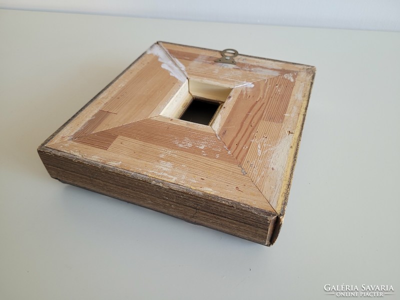 A thick picture frame for a small-sized work